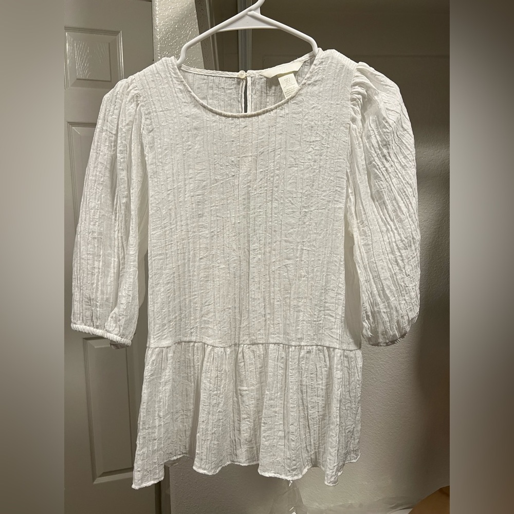 White flowy top